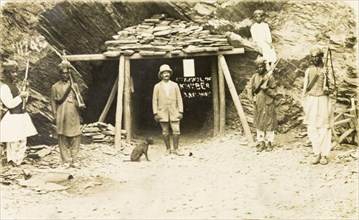 Khyber Railway tunnel. A European supervisor and several Indian armed guards stand at the entrance