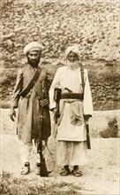 Armed Afridi men. Portrait of two Afridi men at the north west frontier, both armed with rifles and