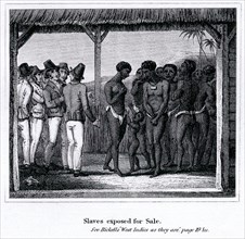 Slaves exposed for sale. Prospective European buyers haggle over a group of imported African