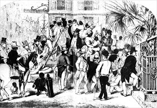 Slave auction at Charleston. Prospective American buyers haggle over a group of imported African