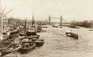 The pool of London'. Boats of all sizes crowd the banks of the River Thames on a section of the
