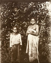 Inhabitants of Bioko. Portrait of a young woman and a boy, inhabitants of the island of Bioko.
