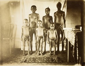 Inhabitants of Bioko. Portrait of six semi-naked children from Bioko, posed standing against a