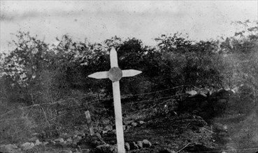Grave near Pieters Hill. A simple wooden cross marks the grave of an unidentified soldier, either