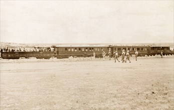 Mail train at Standerton. A mail train passes through Standerton, a town garrisoned by the British