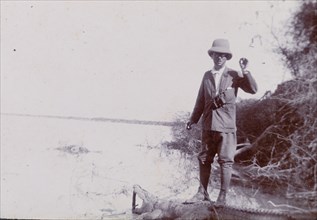 Crocodile hunting in India. Sir Henry Staveley Lawrence, Collector of Karachi, stands on the