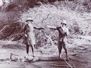 Husband and wife on a crocodile hunt. Sir Henry Staveley Lawrence, Collector of Karachi, holds
