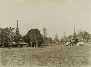 View of Wuntho, Burma (Myanmar). View of Wuntho showing the town's palace (left) and several carved