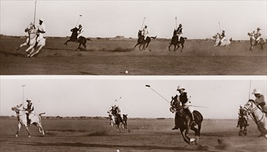 British officers play polo at Omdurman. A number of British military officers ride horses during a