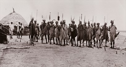 A group of Shilluk warriors. Portrait of a group of Shilluk warriors with their spears. The men