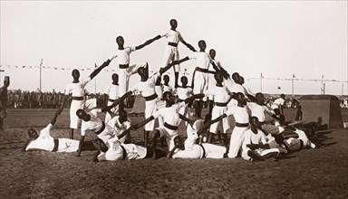 Sudanese military cadets. A group of young Sudanese army cadets, dressed in white uniforms, form a