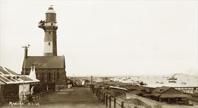Karachi Harbour at Manora Island. Manora Point lighthouse and St. Paul's Church sit on the edge of