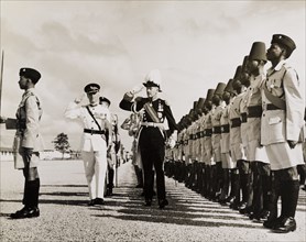 Sir Richard Turnball inspects the Tanganyika Rifles. Sir Richard Turnbull (1909-1998), the last