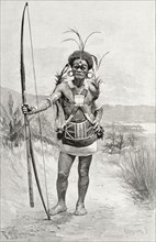 Solomon Islander in traditional dress. Full-length portrait of a male Solomon Islander, wearing