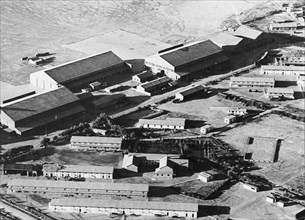 RAF aircraft hangars in Iraq. Aerial view of several aircraft hangars and outbuildings belonging to