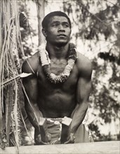 A secondary school student, Solomon Islands. A student of the King George VI School in Auki, drums