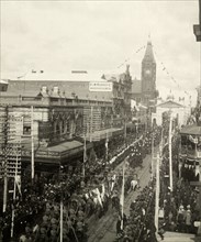 Royal welcome procession, Perth. Crowds line the streets as several military regiments file past