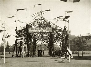 Decorative marquee for the royal visit, Perth. A marquee festooned with garlands and flags at the