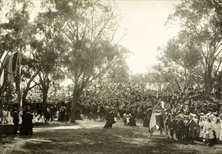 Crowds gather for the royal visit, Perth. Spectators and school children gather in the grounds of