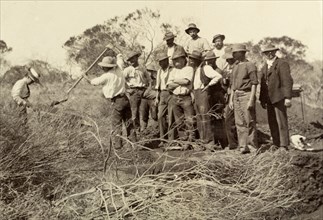 The Lawleys at Laverton gold fields. Sir Arthur Lawley, Governor of Western Australia, shovels