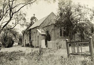 A chapel near Government House, Perth. A small stone chapel, overgrown with ivy, near Perth's