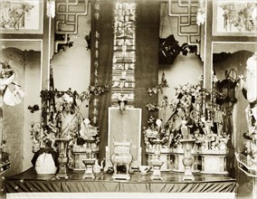 An altar inside a Hong Kong Joss house. An altar inside a Joss house is adorned with religious