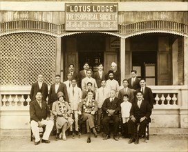 The Theosophical Society in Mandalay. A group of suited Burmese men assemble for a photograph with