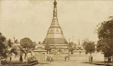 The Sule Pagoda in Rangoon. A line of trees flanks a promenade leading up to the Sule Pagoda.