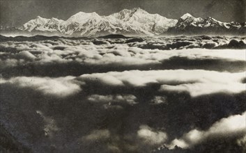 Kanchenjunga shrouded by clouds. View of the Himalayan mountain Kanchenjunga, taken from Tiger Hill