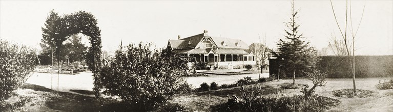Government House, Pretoria. Exterior view across the formal gardens to the colonial-style