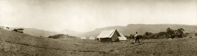 Camp site near Hay's store. A camp site nestles in a mountain valley in the vicinity of Hay's