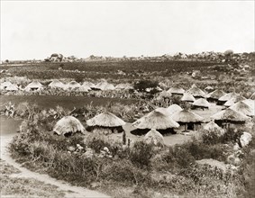 A Matabele village. A Matabele (Ndebele) village near Bulawayo. Matabeleland, Rhodesia