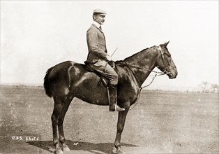 Baden-Powell on horseback. Profile shot of the newly promoted Major General Robert Baden-Powell on
