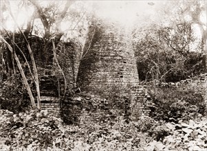 Ruins of Great Zimbabwe. The remains of a conical stone tower at the ruined city of Great Zimbabwe,