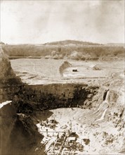 Labourers at Westernberg Mine. Labourers work at the bottom of Westernberg Mine, a large, open-pit