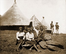Matabele women at Cecil Rhodes' farm. A group of Matabele (Ndebele) women pose for the camera