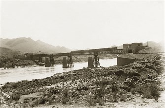 Bridge over the Indus River at Attock. A train travels on a railway bridge across the Indus River.