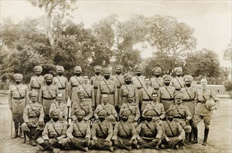 14th Sikh Regiment of the Indian Army. Group portrait of the Sikh officers and British captains of