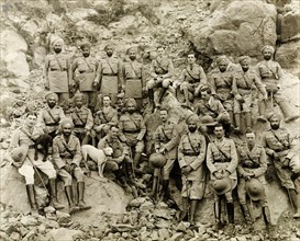14th Sikh Regiment of the Indian Army. The 14th Sikh Regiment pose for a group portrait on a rocky
