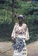 Ghanaian woman in traditional dress. Portrait of a Ghanaian woman, wearing traditional dress