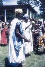 Zongo musicians at a Ngmayem festival. Crowds at an annual Ngmayem harvest festival are entertained