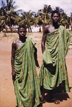 Ghanaian men in kente cloth. Portrait of two Ghanaian men dressed up in traditional kente cloth.