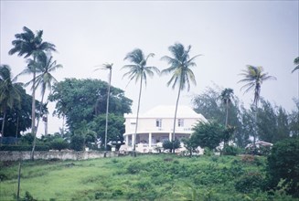 Plantation house in Barbados. View of a colonial plantation house in Barbados, situated amongst