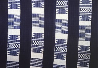 Nigerian woven textile. Close-up of a Nigerian textile, woven in a pattern with blue and white