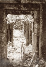 Doorway at the ruins of Gedi. View of a stone arch and doorway amidst the ruins of Gedi, an ancient