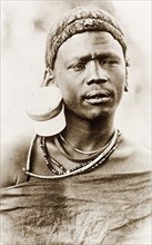 Portrait of a Maasai man. Head and shoulders portrait of a Maasai man, wearing traditional