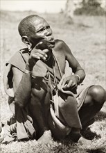 A Kikuyu elder. A Kikuyu elder makes a point during a dispute at a council of elders. Kakamega,