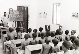 Reading lesson at a Kenyan school. Schoolchildren attend a reading lesson at a school in Kenya.
