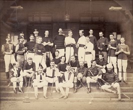 Polo players in Bombay. Uniformed polo teams pose for a group portrait with their polo sticks