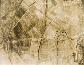 Gun pits and light railway tracks. One of a series of British aerial reconnaissance photographs